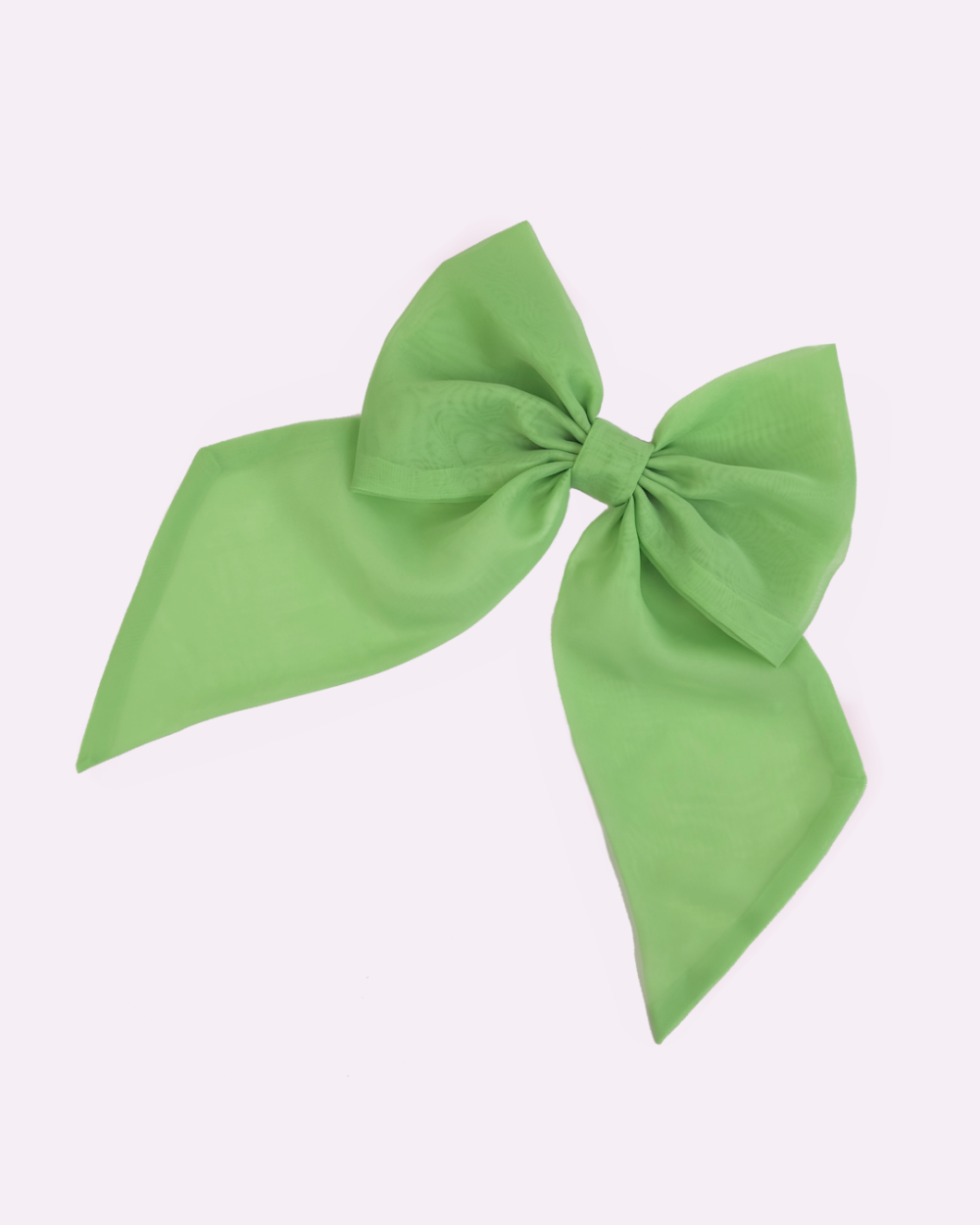 Green brooch in the shape of a giant bow made of voile by melikestea.