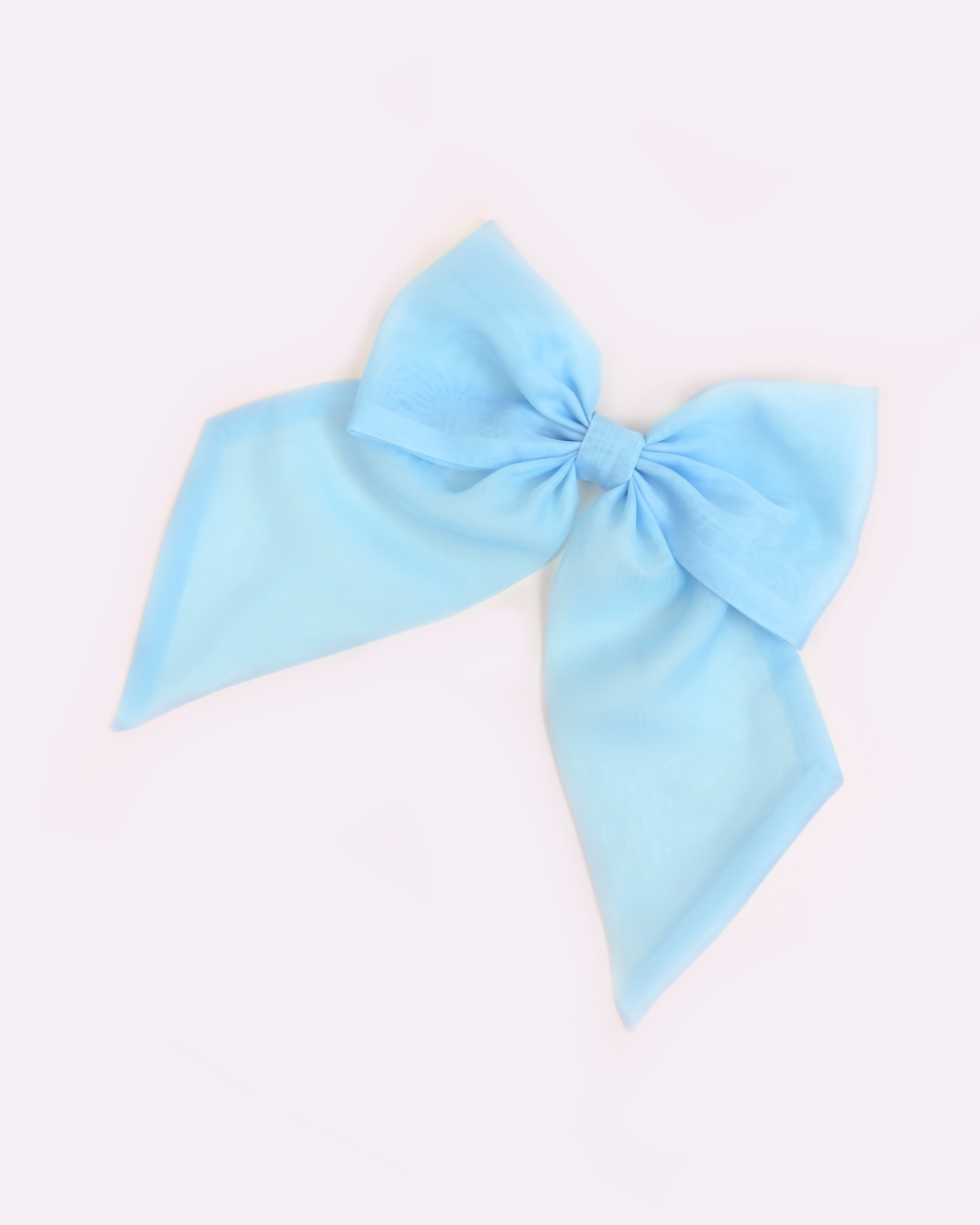 Blue brooch in the shape of a giant bow made of voile by melikestea.
