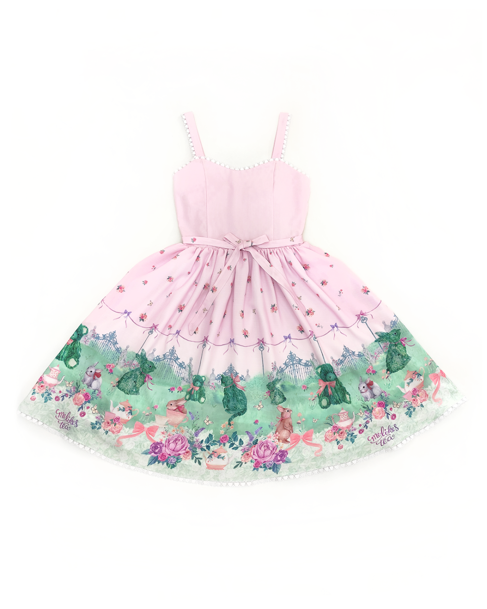 Dress made of pink polyester and cotton printed with a garden full of bunnies, teddy bears, cups and teapots, flowers and a beautiful lawn.