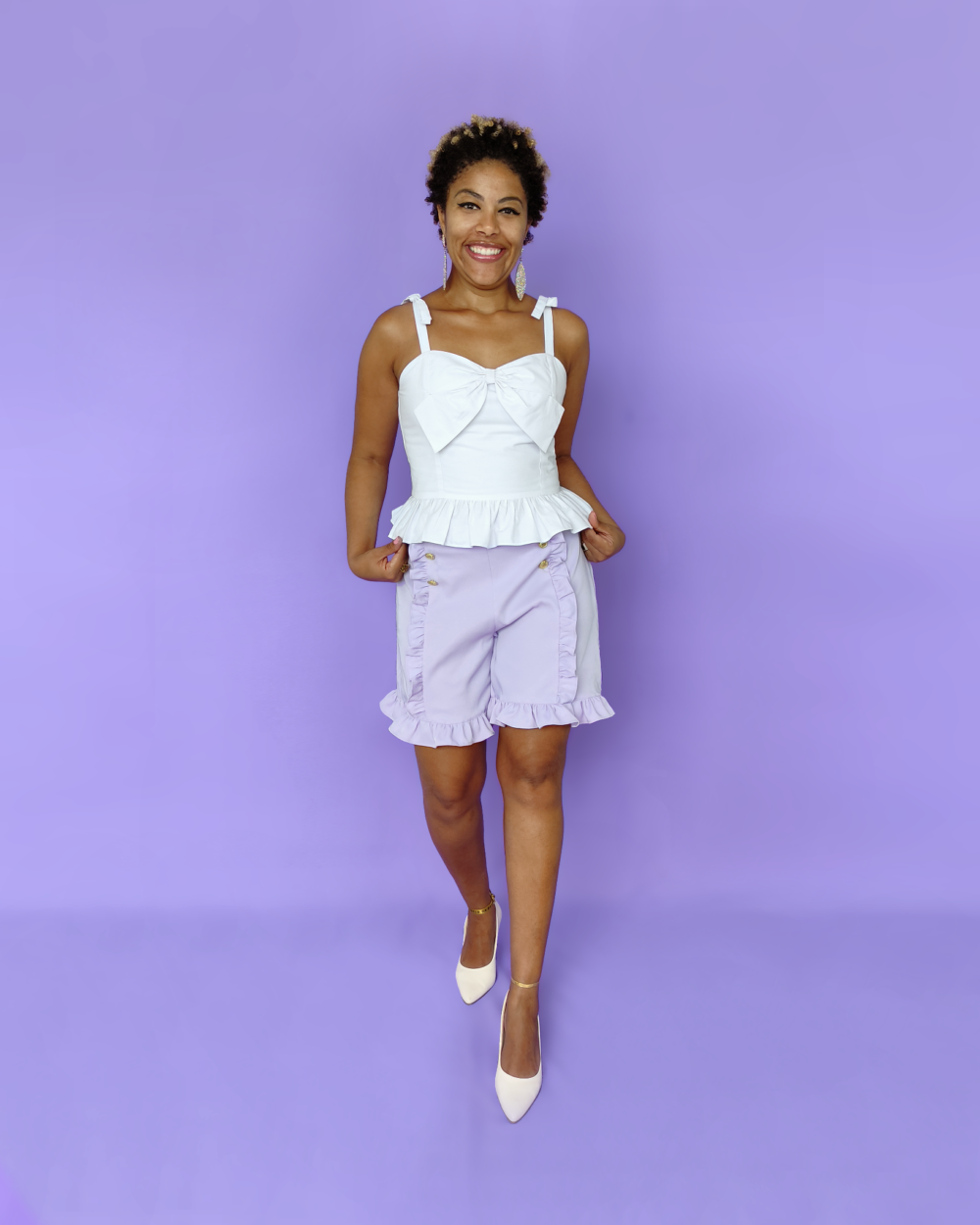 Model wearing Ruffled bow strap cotton top in white color, full back shirring and bow on the bust.