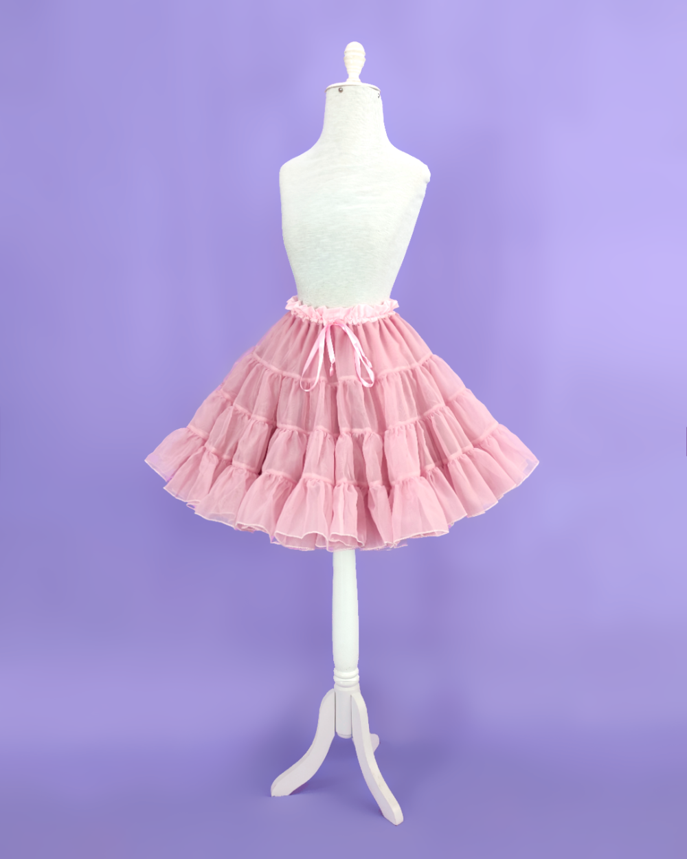Petticoat shaped A-line made in mauve voile and lined.